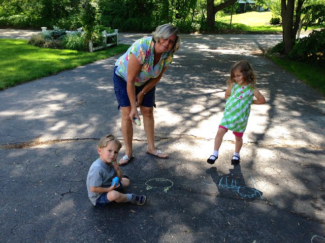 IMG_3652.jpg - Nana is here for a visit and already knee deep in chalk fun.