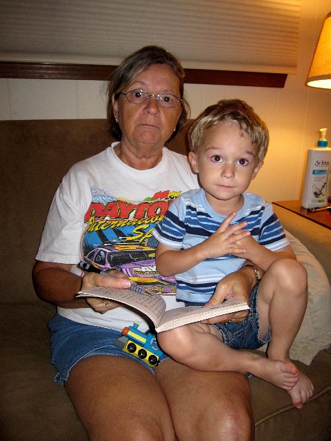IMG_6881.jpg - Nathan and Nana doing a word search book.  Nathan was impressive in finding the right letters.