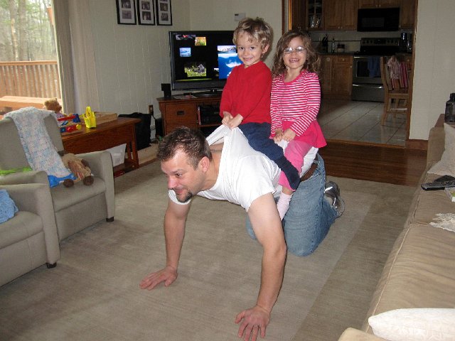 IMG_4452.jpg - Anyone for a "horse" ride?  Daddy gets a workout one way or another around this place!