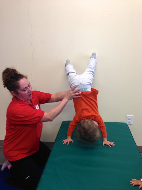 IMG_3353.jpg - Nathan had his own class, Tumble Tykes, with Miss Celeste.  Nice handstand!