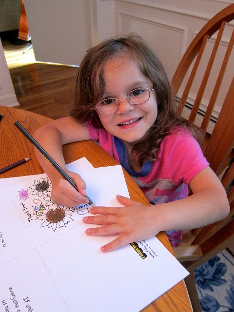 IMG_7120.jpg - Catie Ann is busy at work coloring and signing all the Thank You cards for her preschool teachers as the school year comes to a close.
