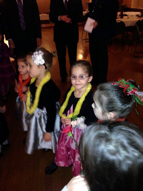 IMG_2280.jpg - Our little princess is patiently awaiting her turn for the limbo (again).  Looks like it was a great time!