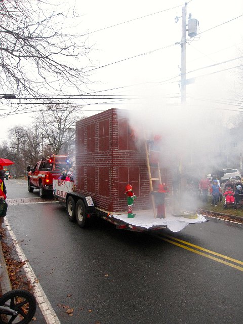 IMG_8932.jpg - The parade is sponsored by the Firefighters so this year they included a little fire safety tips/education along the way too.