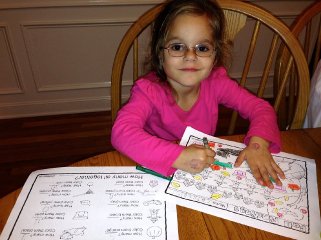 IMG_4749.jpg - Catherine's first homework assignment!!!  She had to color and count the items on the printout.