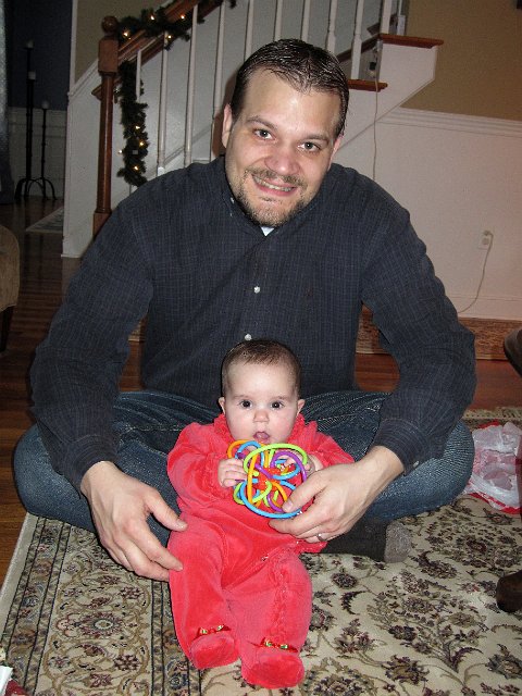 IMG_4740b.jpg - Catherine and Daddy opening gifts.