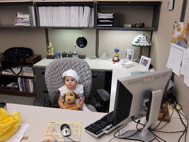 IMG_0404b.jpg - ... and even trying out his office (with her pal, Charlie).