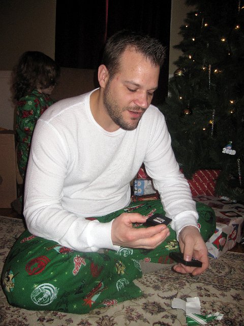 IMG_2341b.jpg - Even Dad was surprised with his gifts.