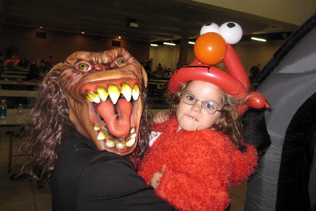 IMG_6764.JPG - The Burkett kiddos didn't seem to be phased by the spooky-masked people wanting to say Hello.