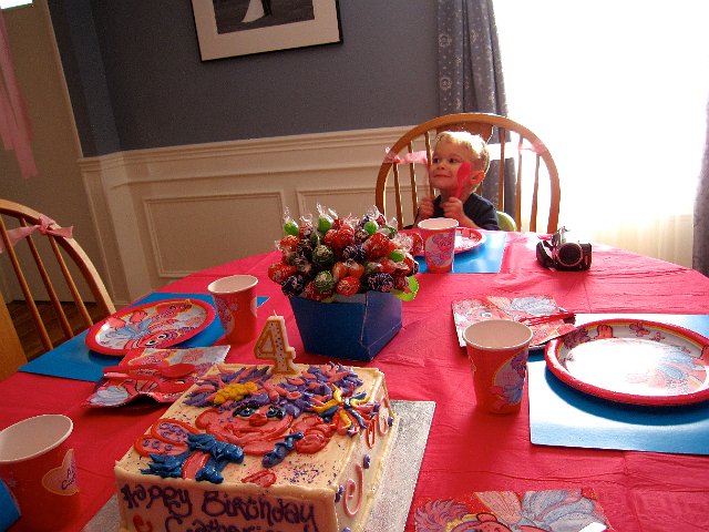 IMG_0749.jpg - Even Nathan was very eager for all of the party events .. mostly the cake.