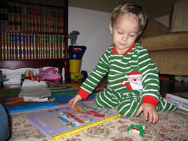 IMG_3444.jpg - Nathan enjoys all things that go. This book is going to be a great item for some quiet time exploring every detail with Mom or Dad.  Thanks Aunt Marty