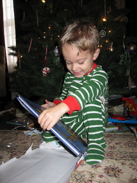 IMG_3461.jpg - A book with bull dozers and dump trucks = one happy boy.  Thanks Grandmum & Grandpop