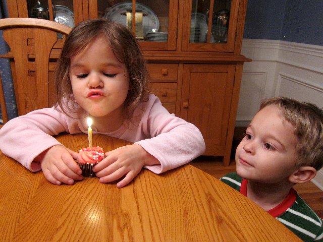 IMG_6229.jpg - "Happy Birthday to Jesus" song, candle blowing and cupcake celebration.