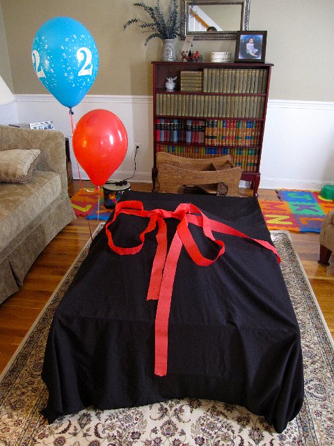 IMG_0560.jpg - A gift for him to open later (train table and set).