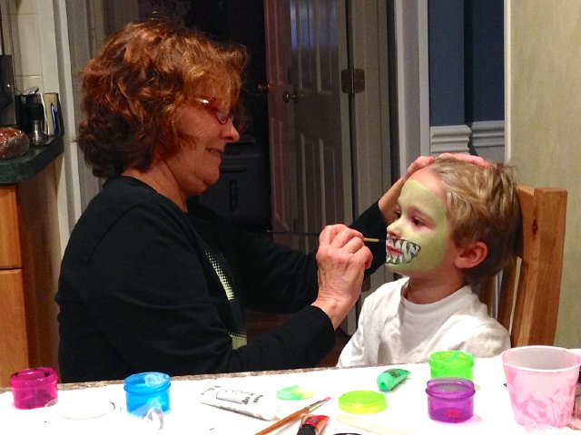 IMG_4926.jpg - It's Halloween prep time.  Miss Mary assisted with some face painting, what fun!