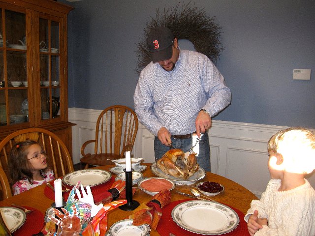 IMG_8824.jpg - Daddy carving the bird.