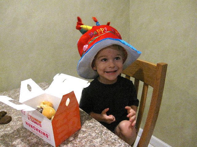 IMG_6484.jpg - We kickoff Nathan's birthday with MUNCHKINS from Dunkin Donuts!
