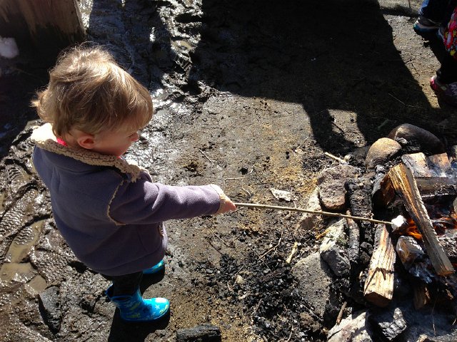 IMG_1305.jpg - This kid is a natural with a marshmallow!