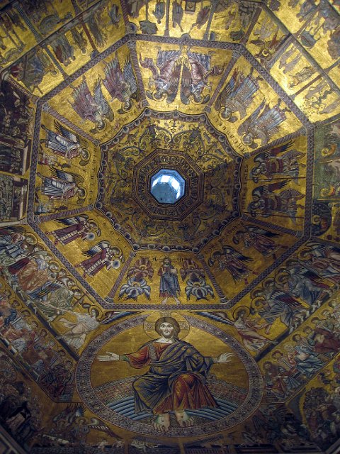 Baptistry-05.JPG - This mosaic cycle depicts in the three sections above the high altar, the Last Judgment with a gigantic, majestic Christ and the Angels of Judgment at each side, the rewards of the saved leaving their tomb in joy (at Christ's right hand), and the punishments of the damned (at Christ's left hand).