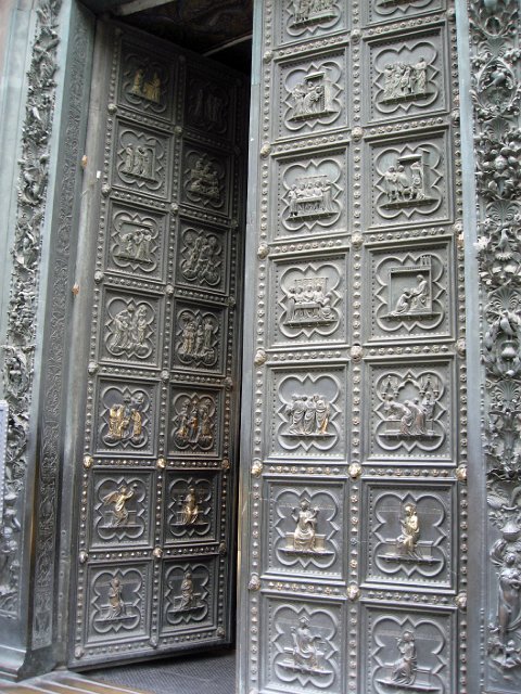 Baptistry-09.JPG - These doors consist of 28 quatrefoil panels, with the 20 top panels depicting scenes from the life of St. John the Baptist. The eight lower panels picture virtues (hope, faith, charity, humility, fortitude, temperance, justice and prudence).