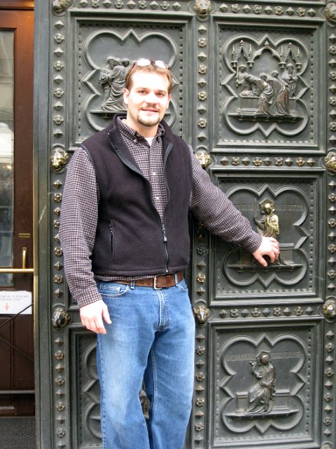 Baptistry-12.JPG - Mike standing by the panel of Humility.