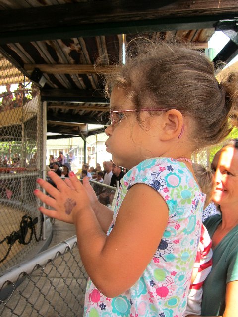 IMG_4802.jpg - Catherine was really getting into all the clapping and cheering that was taking place in the crowd.