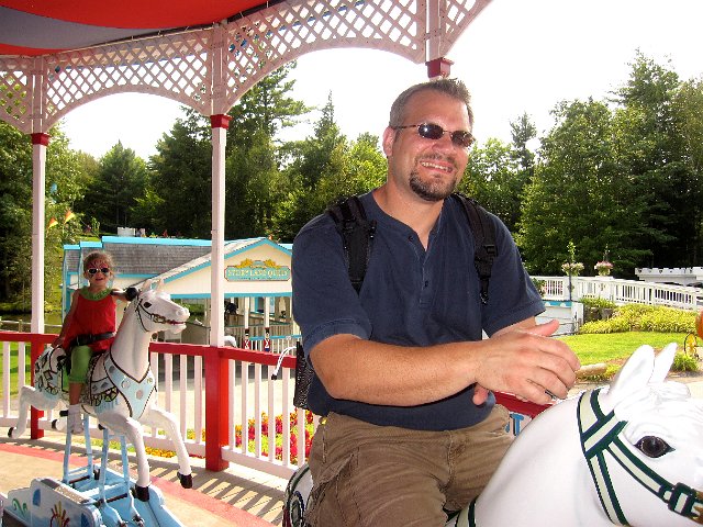 IMG_1852.jpg - (Yes, Daddy included, loves the merry-go-round.)