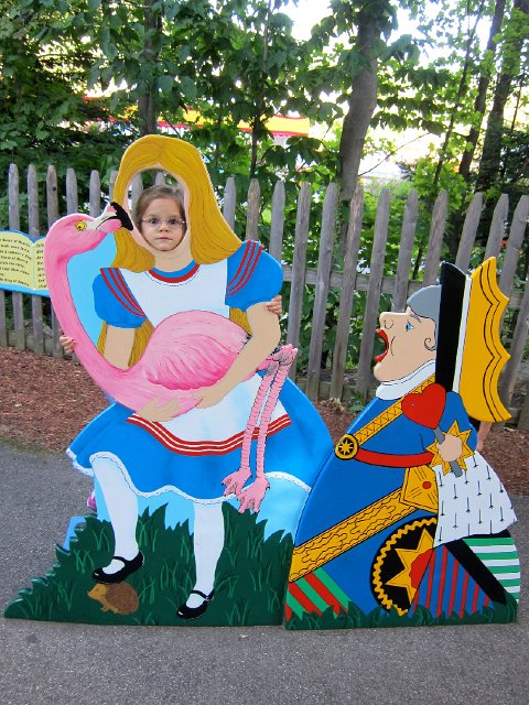 IMG_4970.jpg - We survived with spinning cups and stopped for some photos with Alice and pals.